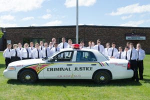 Criminal Justice students pose with the new cruiser donated by Rensselaer County Sheriff Pat Russo